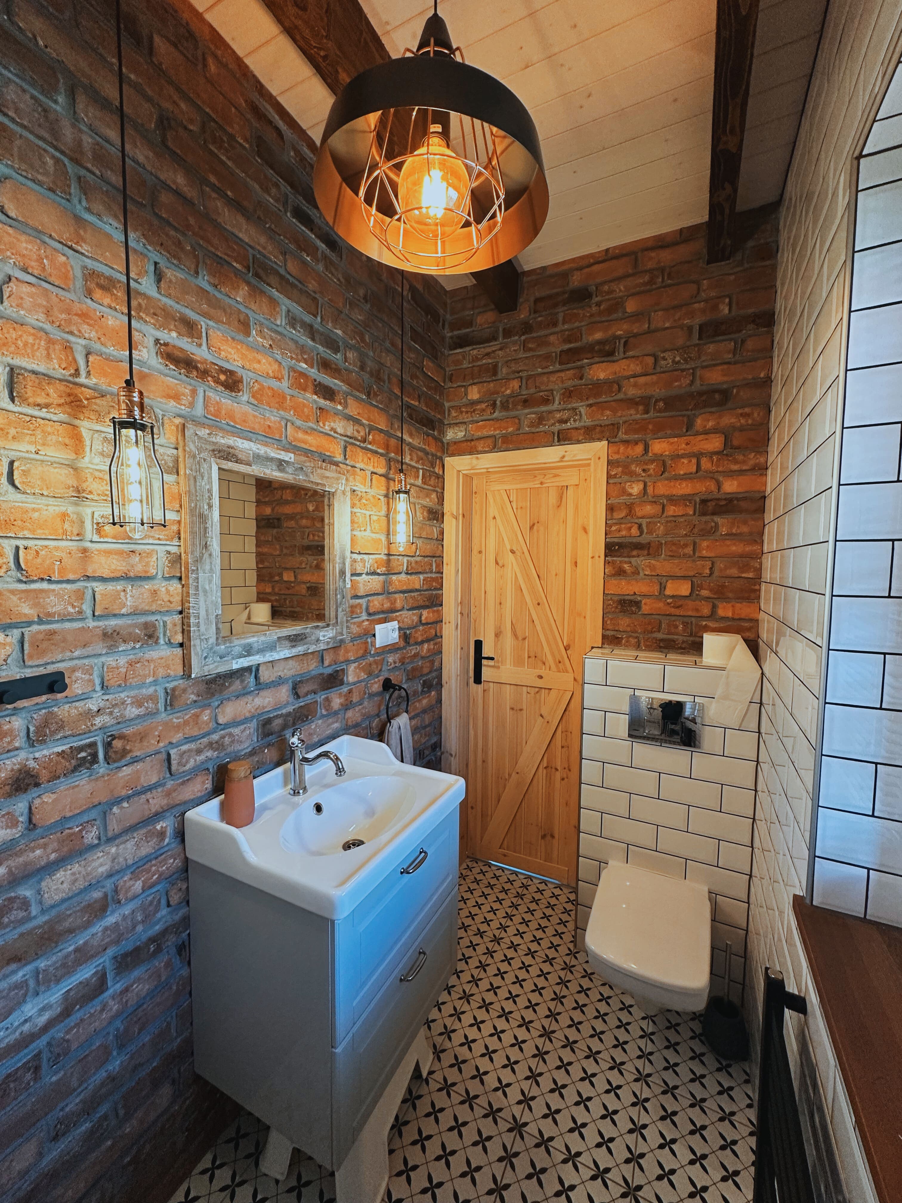 Full view of industrial-style bathroom